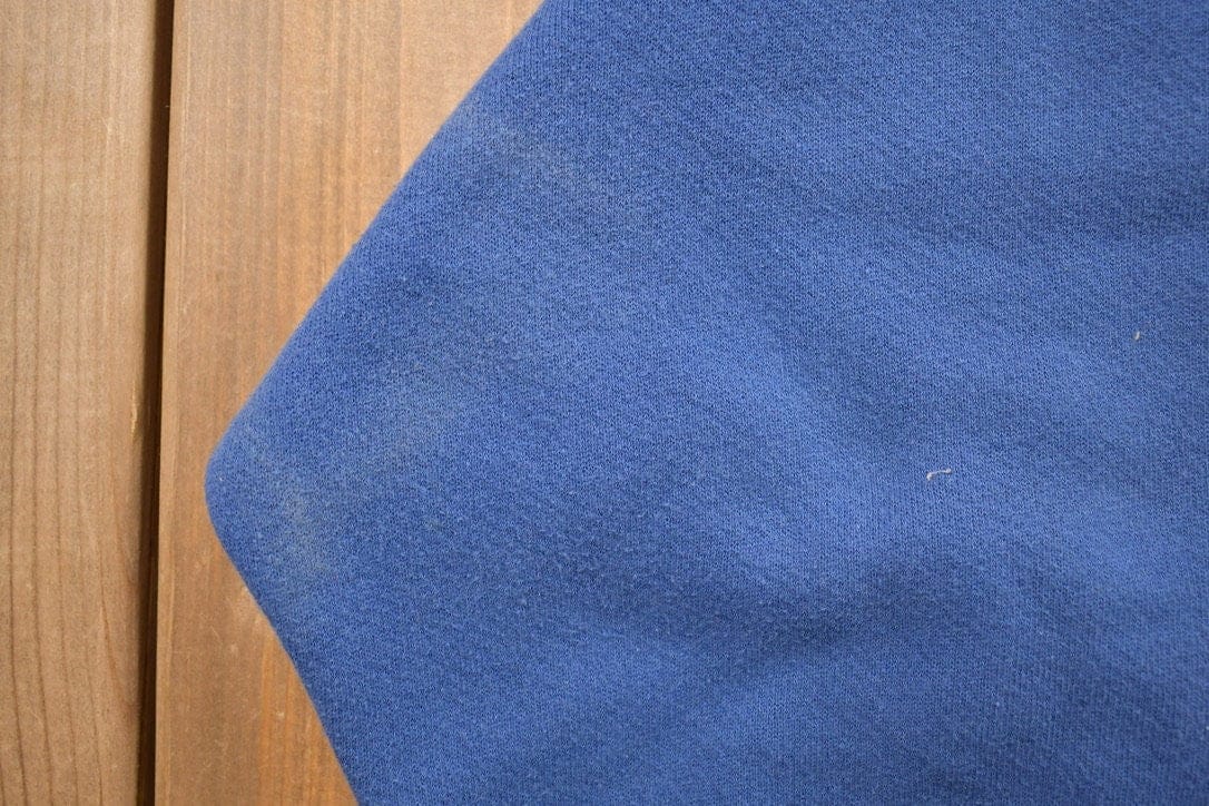 Vintage 1990s Blank Blue Crewneck Sweatshirt Men's 2XL from propervintagecanada