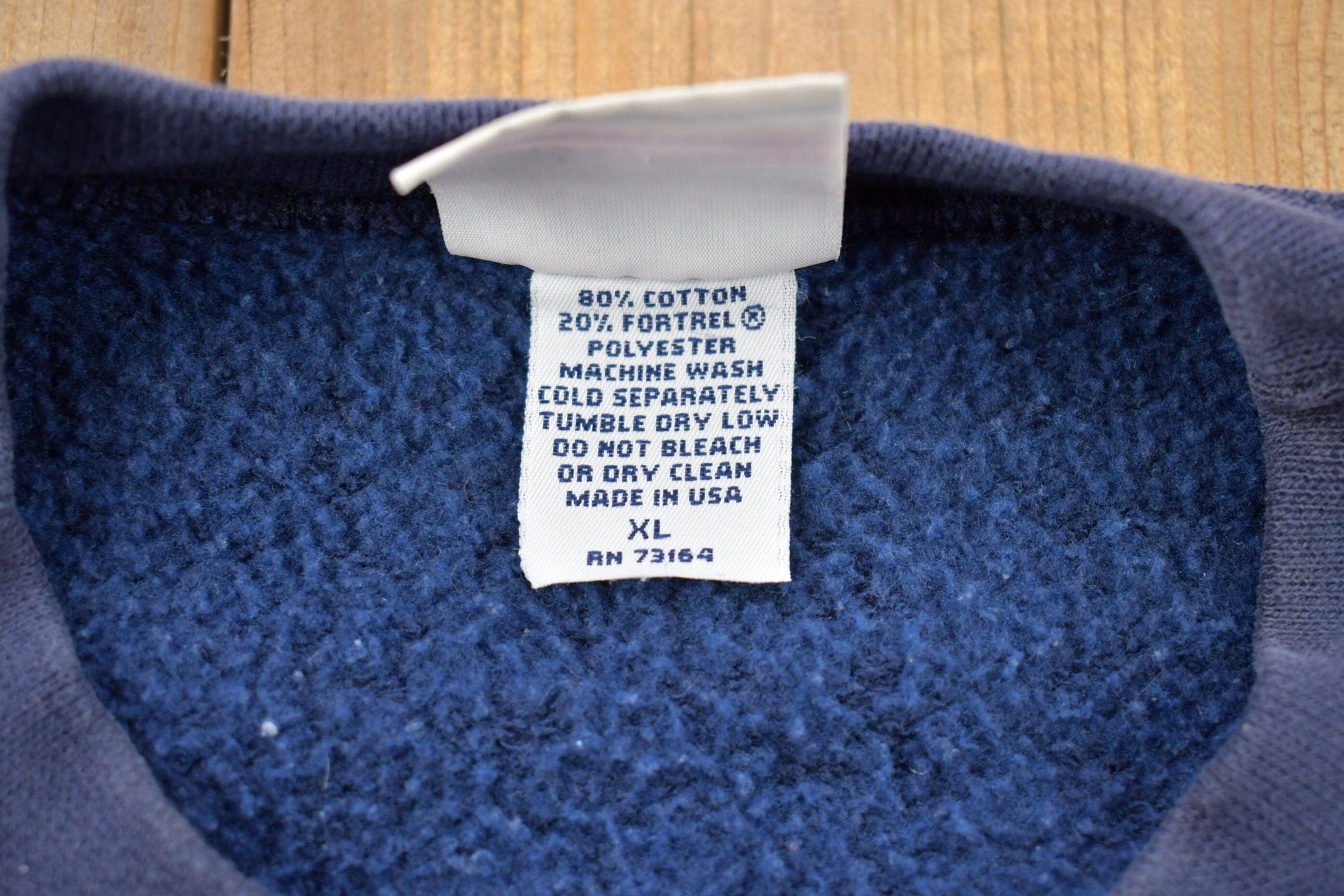 Vintage 1990s Blank Navy Blue Pluma Crewneck Sweatshirt Men's XL from propervintagecanada