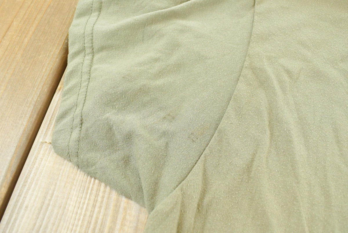 Vintage 1990s Blank Olive Green T-Shirt Men's L from propervintagecanada