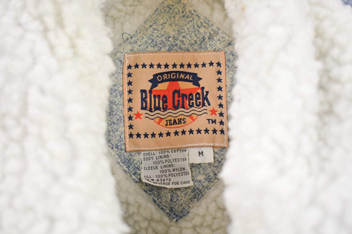 Vintage 1990s Blue Creek Acid Wash Denim Full Length Jean Jacket from propervintagecanada