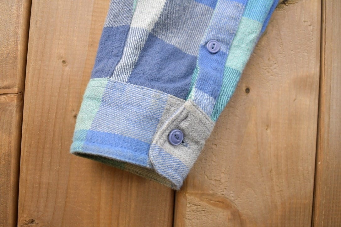 Vintage 1990s Blue Flannel Plaid Button Up Western Shirt Men's Large from propervintagecanada