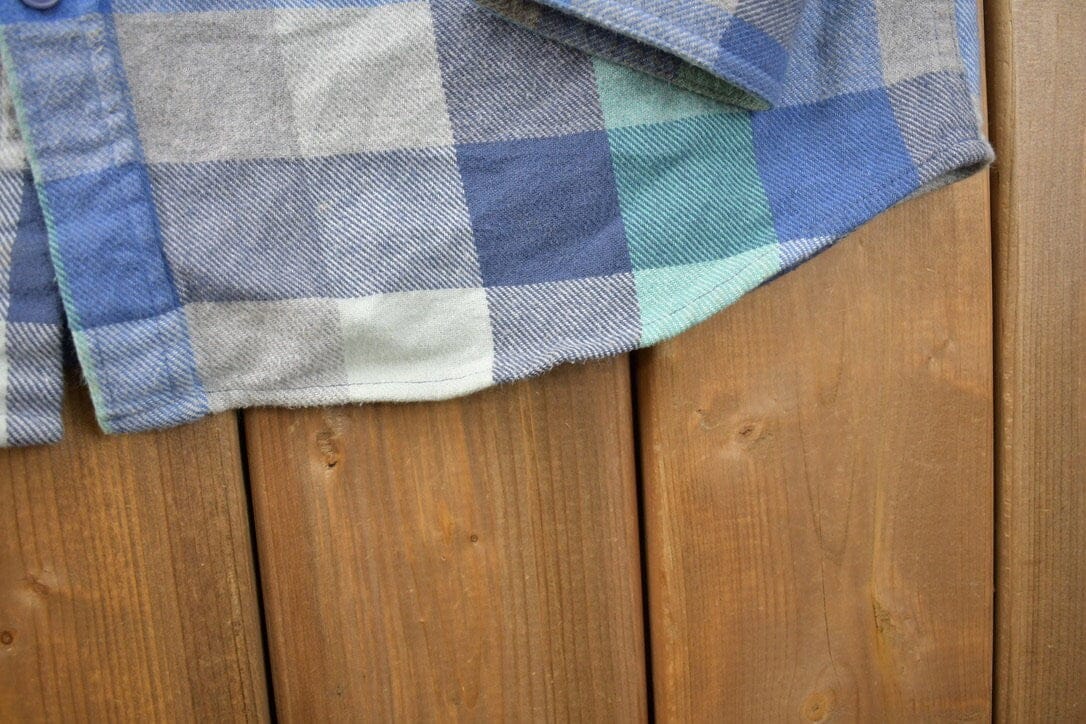 Vintage 1990s Blue Flannel Plaid Button Up Western Shirt Men's Large from propervintagecanada