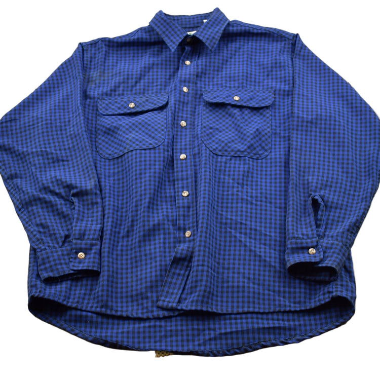 Vintage 1990s Blue Plaid Flannel Button Up Shirt Men's XL from propervintagecanada
