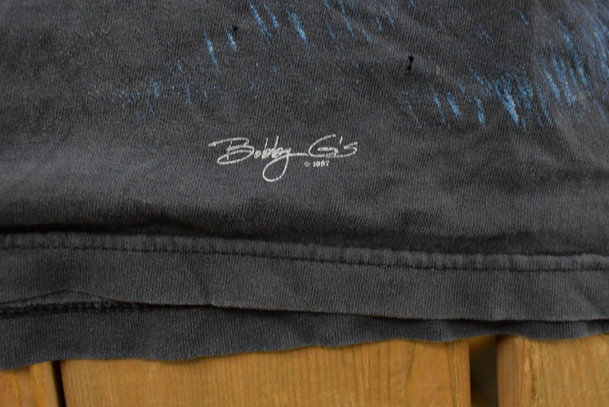Vintage 1990s Bobby G's Black Panther Graphic T-Shirt Men's 2XL from propervintagecanada