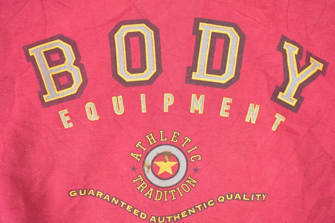Vintage 1990s Body Equipment Graphic Print Crew Neck Sweatshirt Men's L from propervintagecanada
