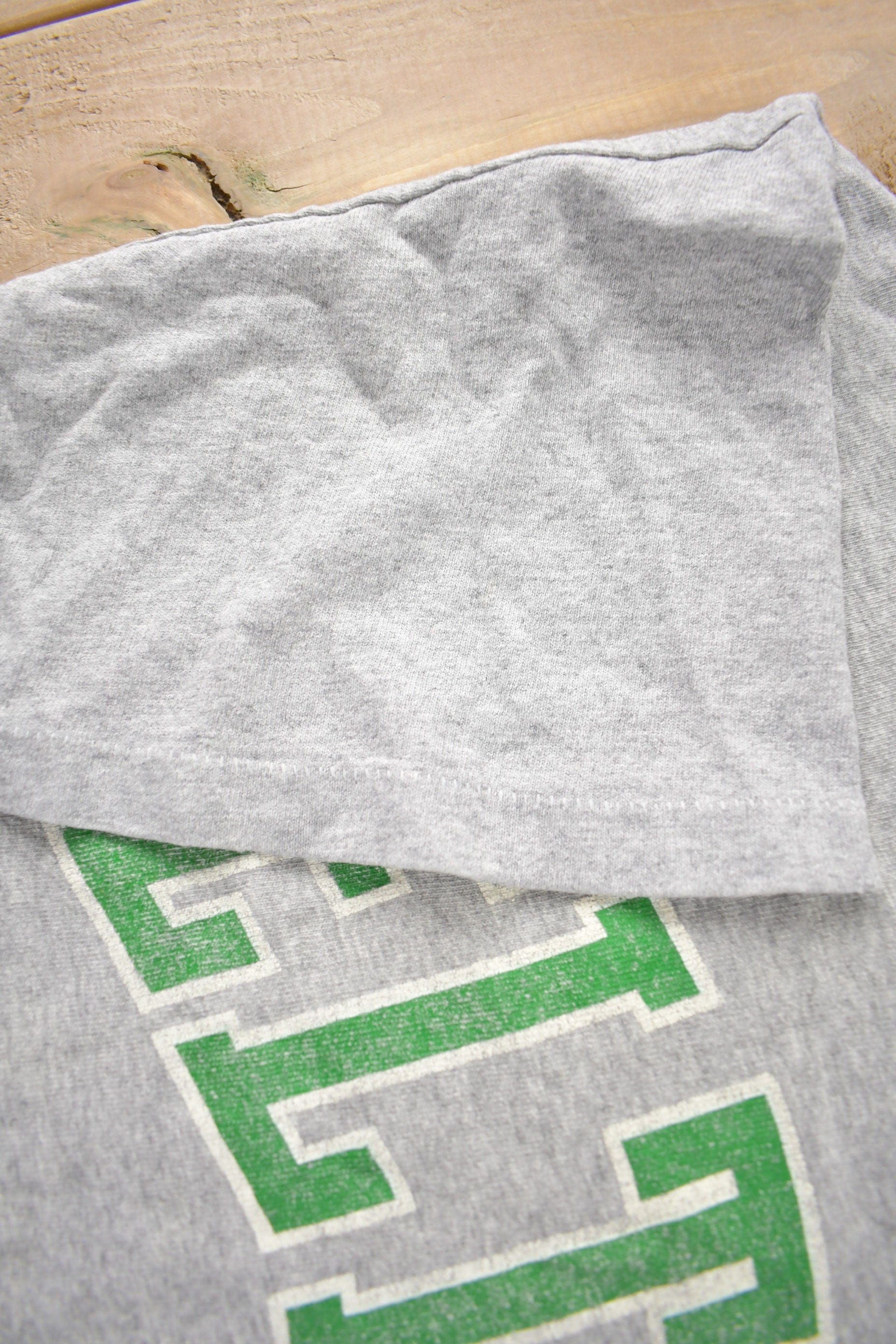 Vintage 1990s Boston Celtics NBA Basketball Starter Graphic T-Shirt Made In USA from propervintagecanada