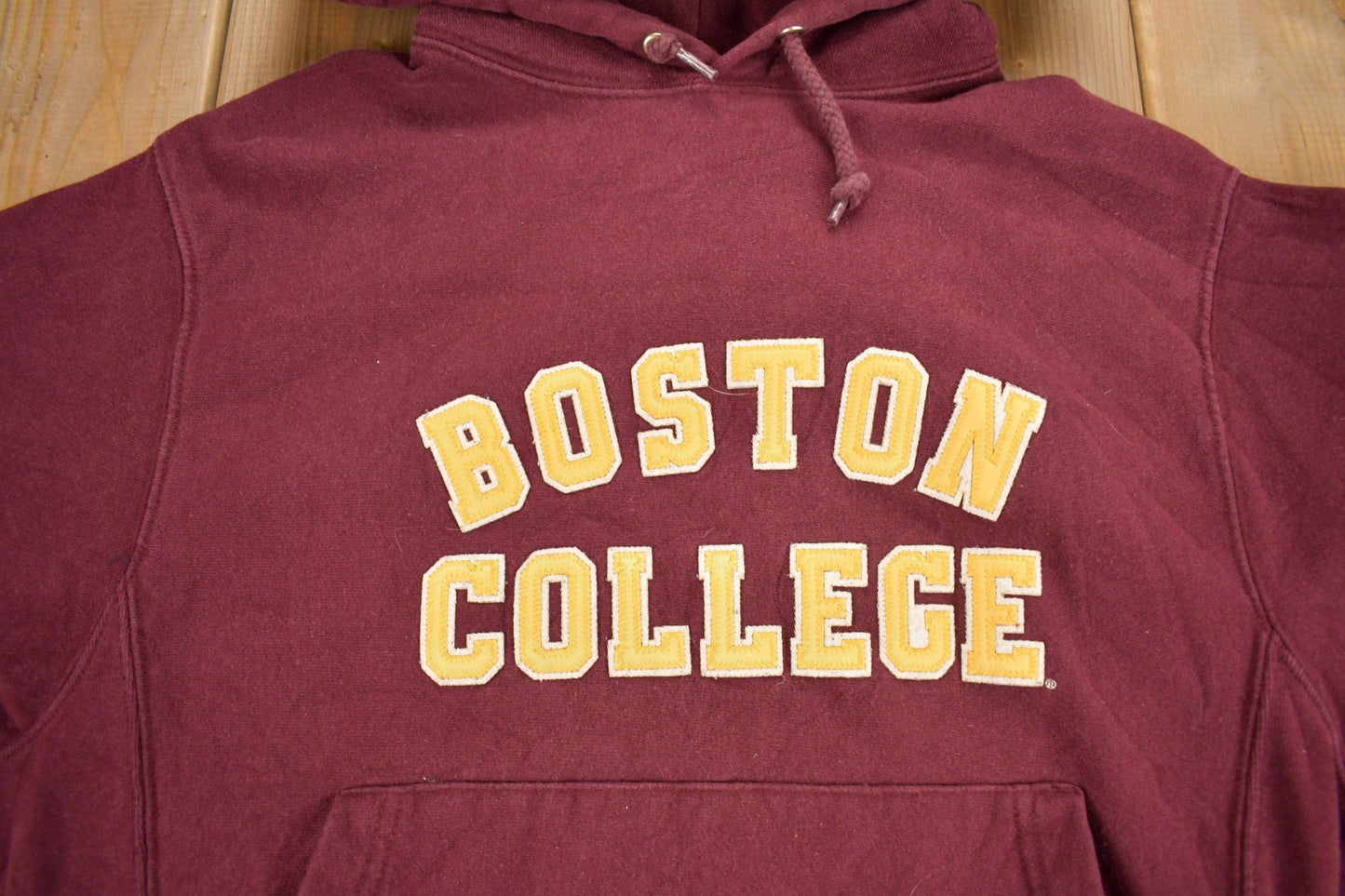 Vintage 1990s Boston College Champion Reverse Weave Collegiate Hoodie Men's S from propervintagecanada