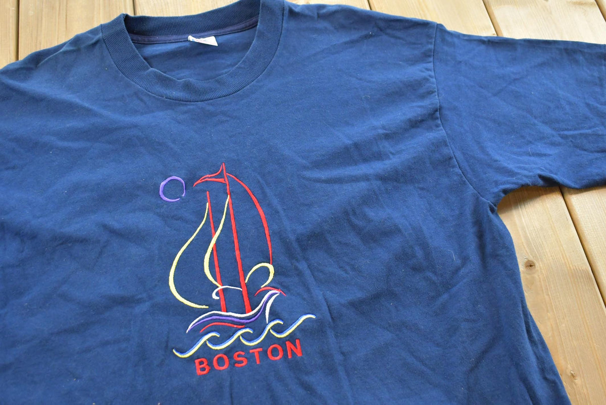 Vintage 1990s Boston Embroidered Sailboat T-Shirt Mens L from propervintagecanada