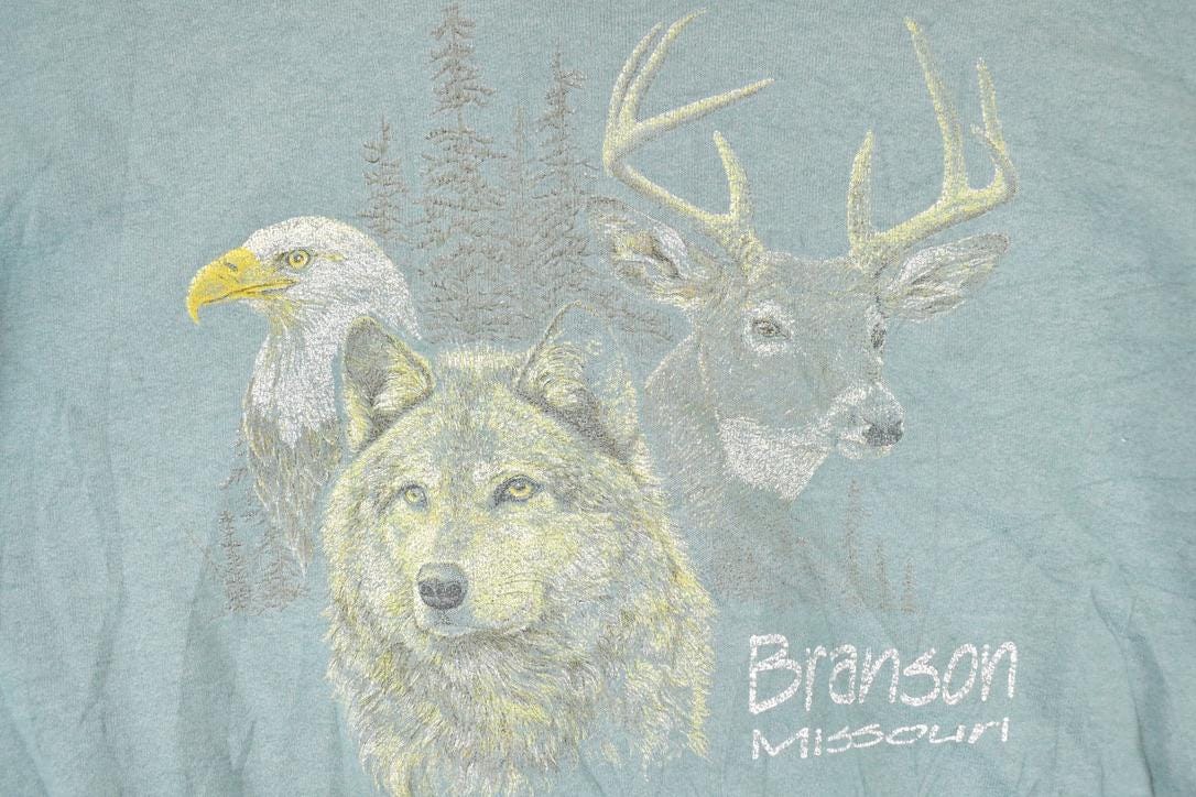 Vintage 1990s Branson Missouri Wolf Hawk And Deer Graphic Print Crewneck Sweatshirt Men's L from propervintagecanada
