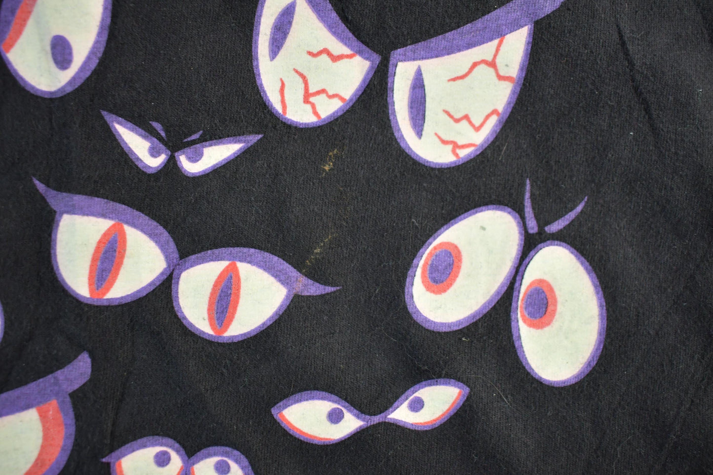 Vintage 1990s Brieland Graphics Glow In The Dark Eyes T-Shirt Men's Large from propervintagecanada