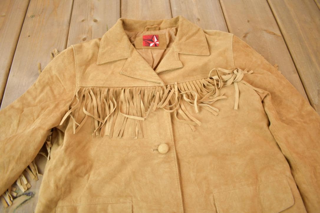 Vintage 1990s Brown Suede Leather Fringe Jacket Women's S from propervintagecanada