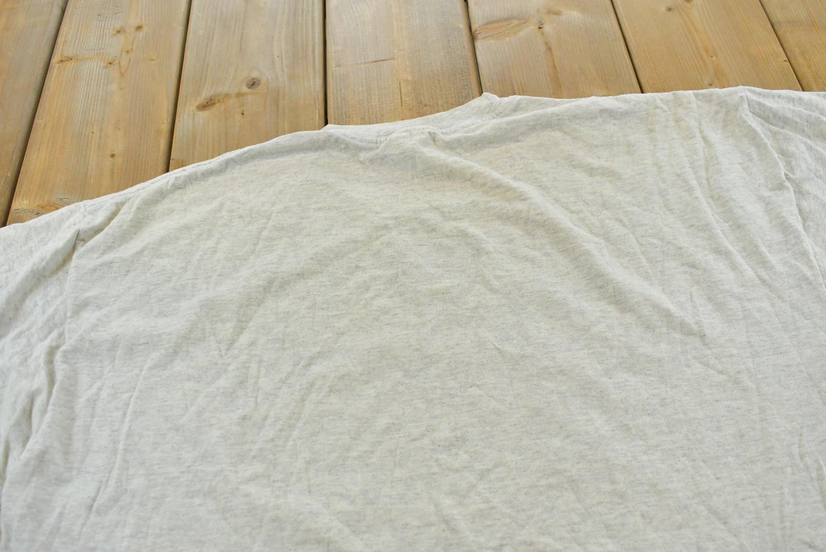 Vintage 1990s Buckskin Bob Parody Funny T-Shirt Men's XL from propervintagecanada
