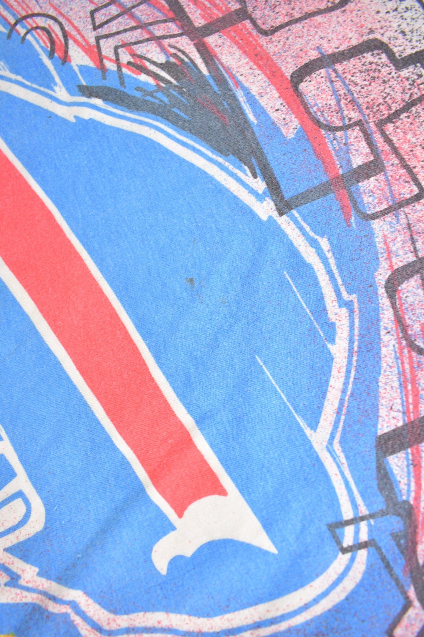 Vintage 1990s Buffalo Bills NFL All Over Print T-Shirt Men's Large from propervintagecanada