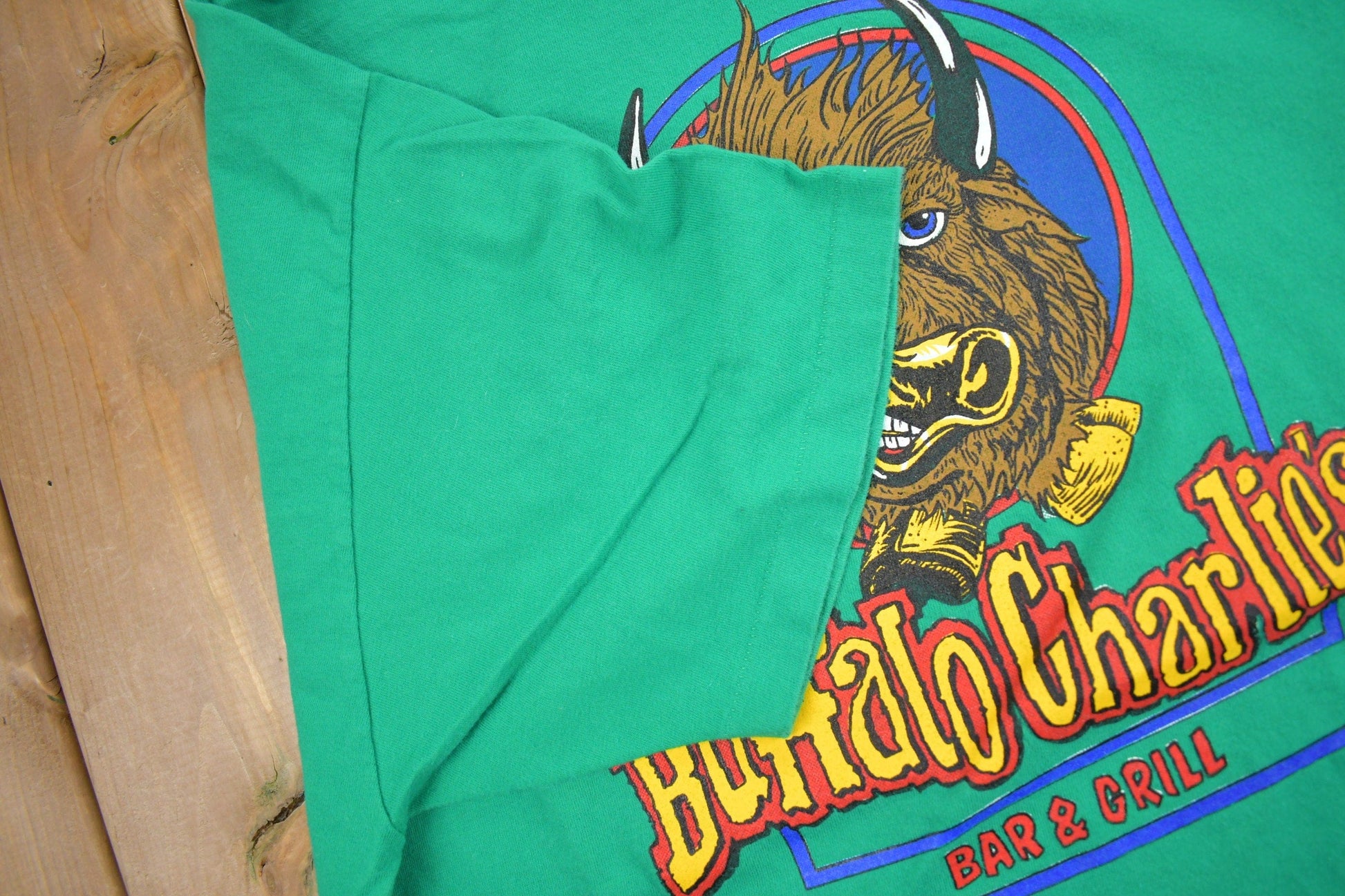 Vintage 1990s Buffalo Charlies Bar & Grill Graphic T Shirt Men's XL from propervintagecanada