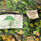 Vintage 1990s Bushlan AOP Woodland Camo Button Up Shirt Mens L from propervintagecanada