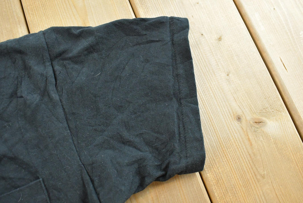 Vintage 1990s BVD Black Blank Pocket T-Shirt Men's L from propervintagecanada