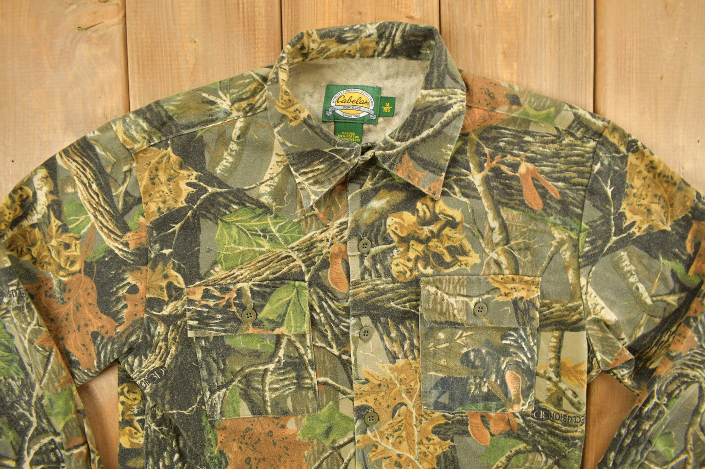 Vintage 1990s Cabela's For Kids Tree Camouflage Button Up Shirt Youth XL from propervintagecanada