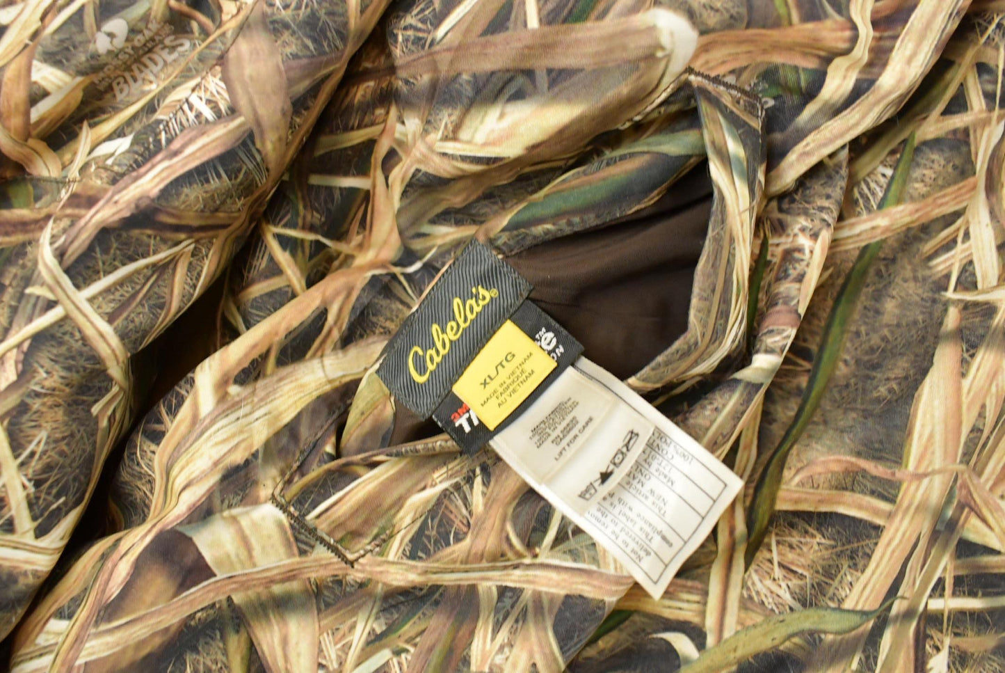 Vintage 1990s Cabela's Tree Camo Reversible Jacket Men's XL from propervintagecanada
