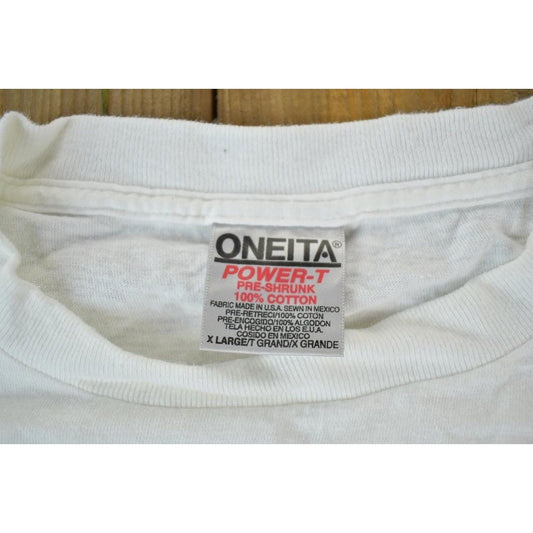 Vintage 1990s Cafe Encore Souvenir Single Stitch Graphic Print T-Shirt Men's XL from propervintagecanada