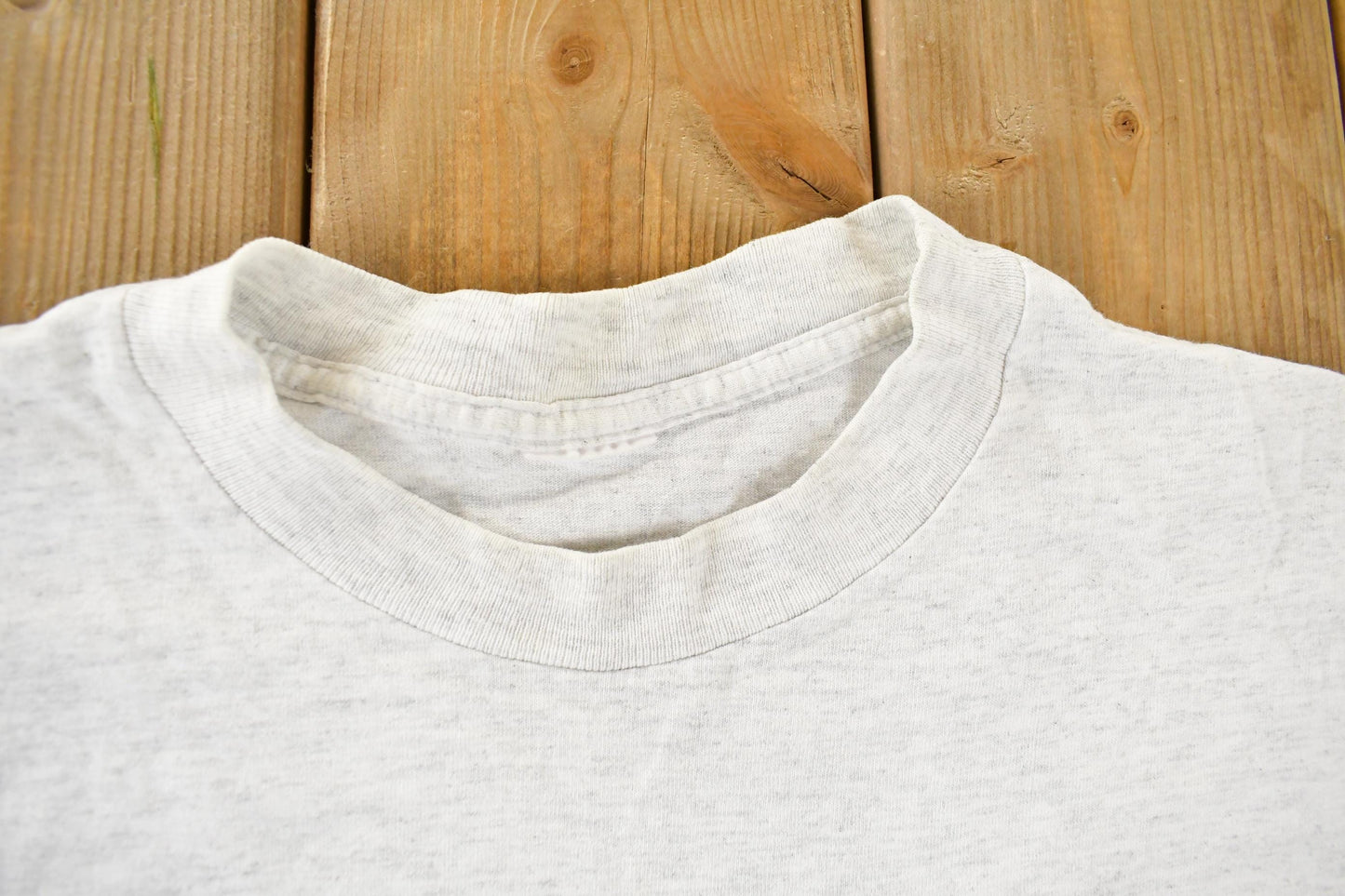 Vintage 1990s Cal State Fullerton Floral Single Stitch T-Shirt Men's Large from propervintagecanada
