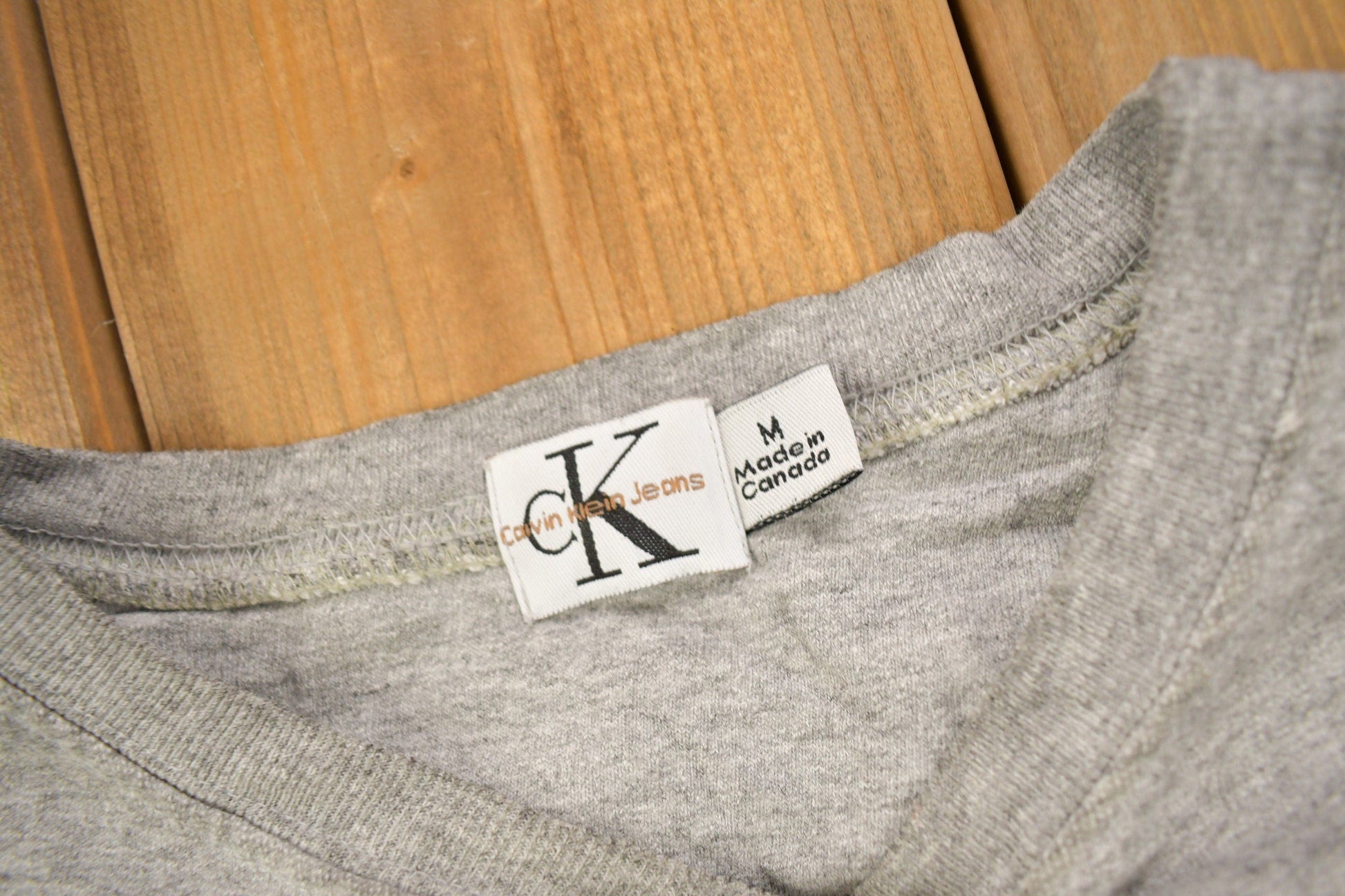 Vintage 1990s Calvin Klein Crewneck Sweatshirt Men's Large from propervintagecanada