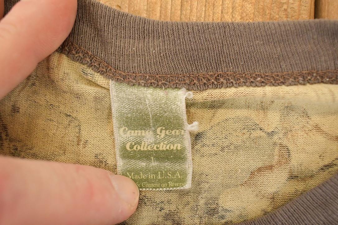 Vintage 1990s Camo Gear Collection Realtree Camo AOP Graphic Print Crewneck Shirt Mens L from propervintagecanada