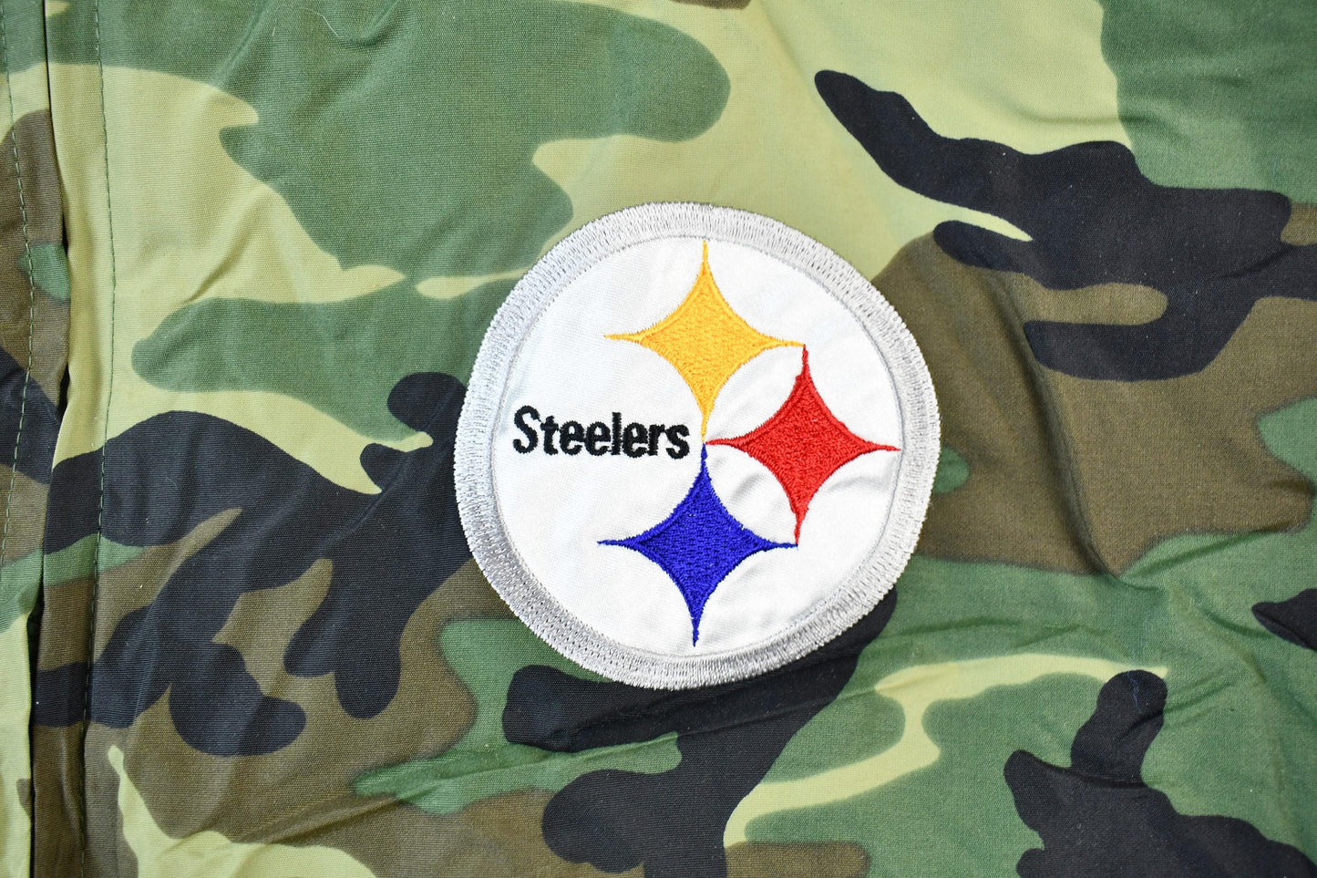 Vintage 1990s Camo Pittsburgh Steelers NFL Football Hooded Puffer Jacket Men's 3XL from propervintagecanada