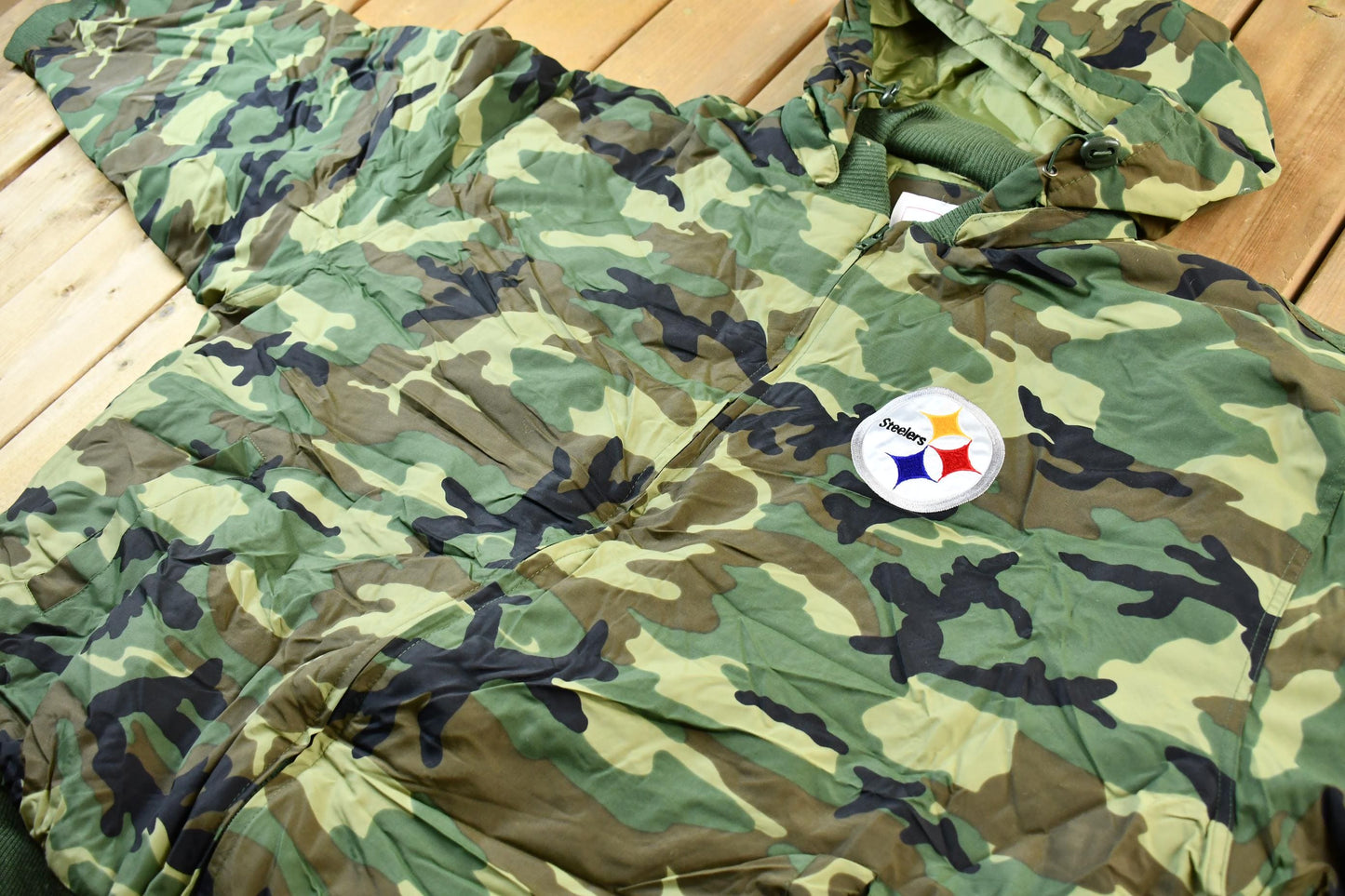 Vintage 1990s Camo Pittsburgh Steelers NFL Football Hooded Puffer Jacket Men's 3XL from propervintagecanada