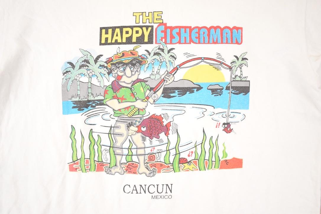 Vintage 1990s Cancun Mexico Happy Fisherman Souvenir T-Shirt Men's M from propervintagecanada