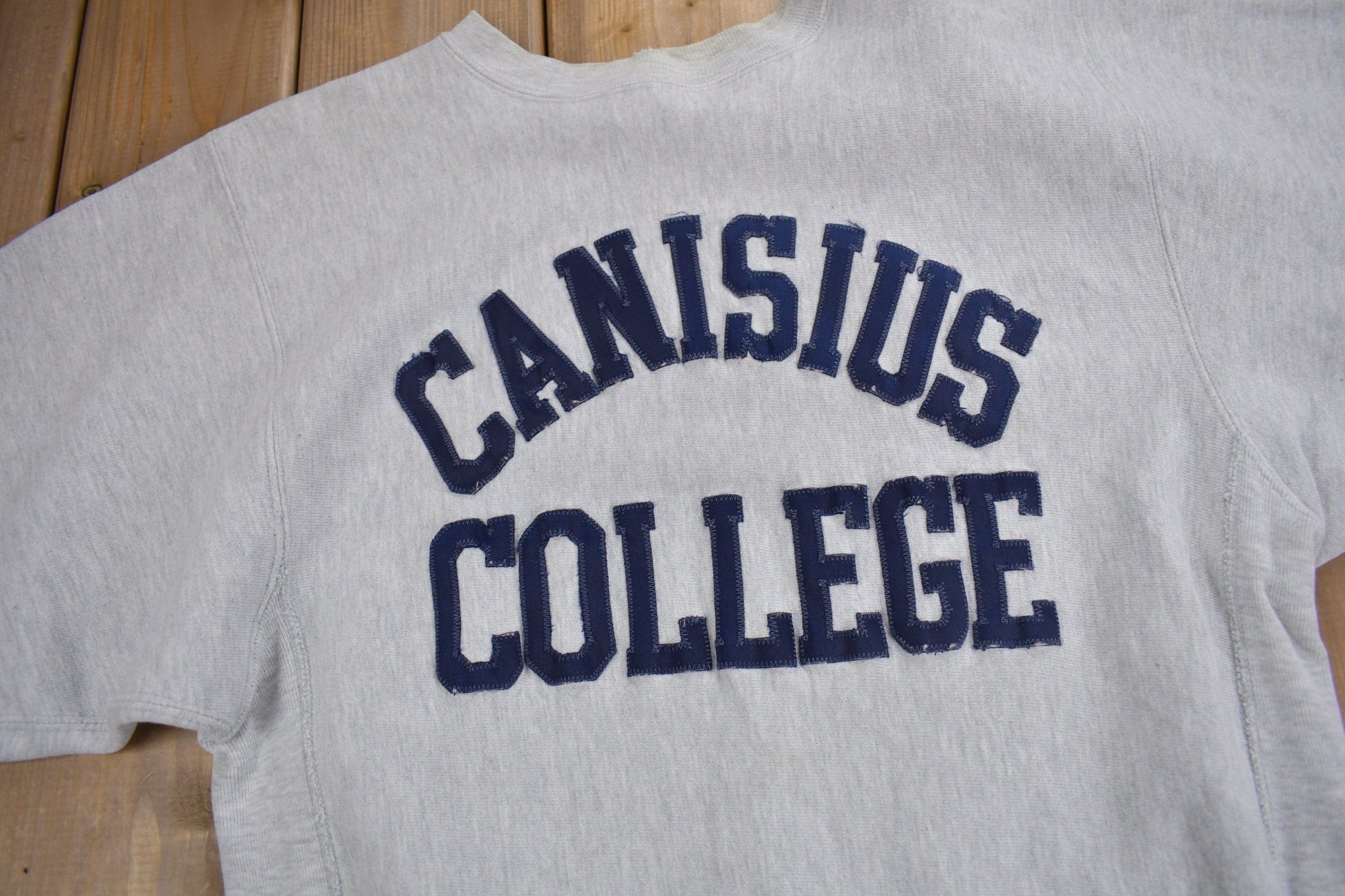 Vintage 1990s Canisius College Champion Reverse Weave Crewneck Men's Medium from propervintagecanada
