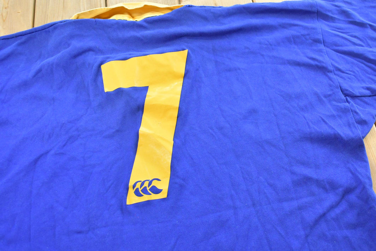 Vintage 1990s Canterbury DeClute Remax Rugby Jersey Polo Collared T-Shirt Mens 2XL from propervintagecanada