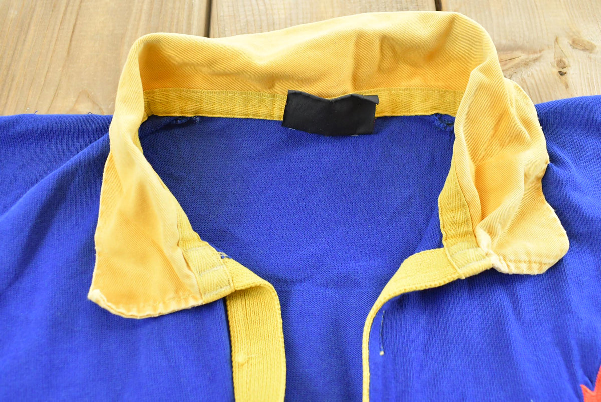 Vintage 1990s Canterbury DeClute Remax Rugby Jersey Polo Collared T-Shirt Mens 2XL from propervintagecanada