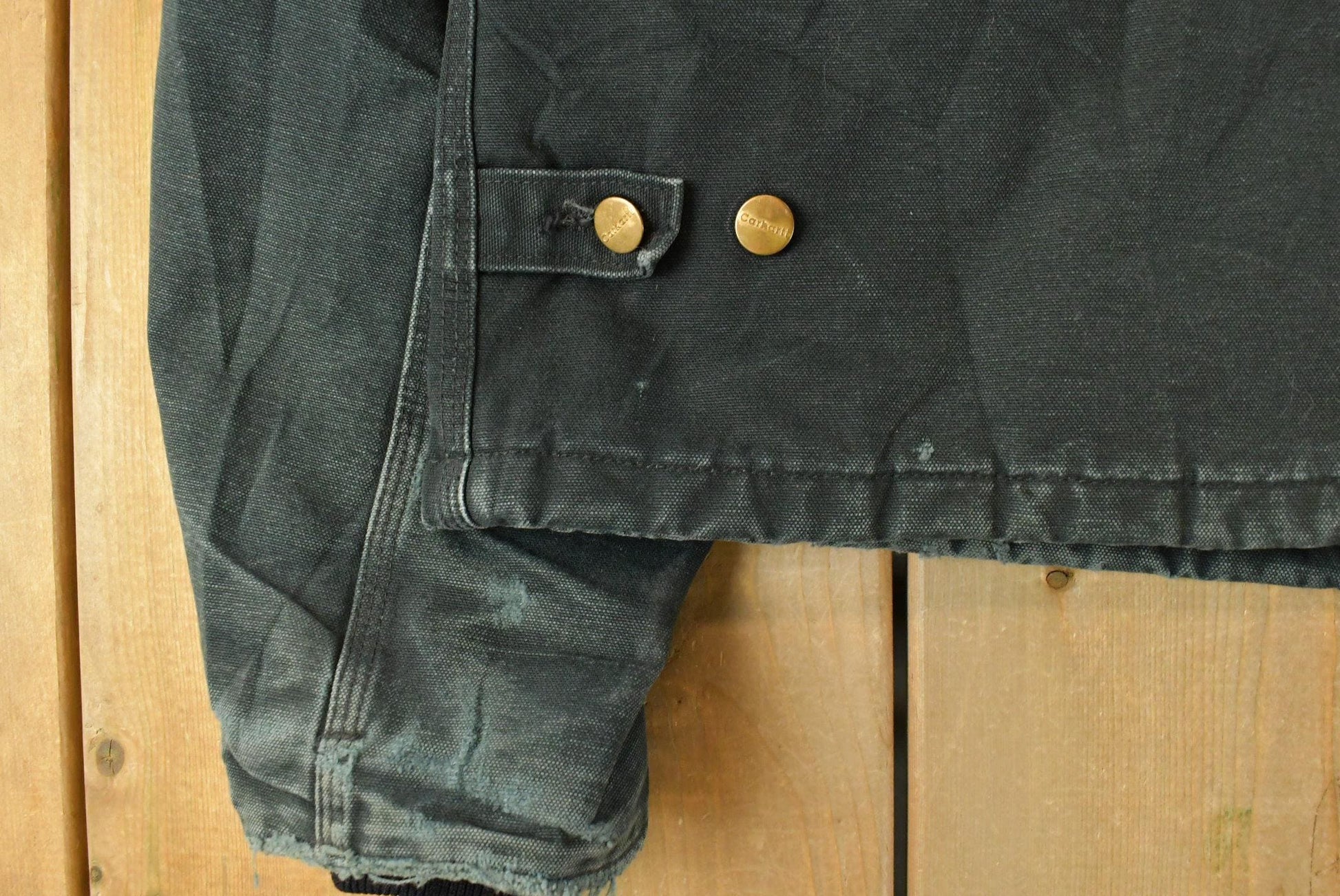 Vintage 1990s Carhartt Arctic Quilt Lined Jacket Men's XL / Distressed Sun Faded / Black Workwear Coat from propervintagecanada