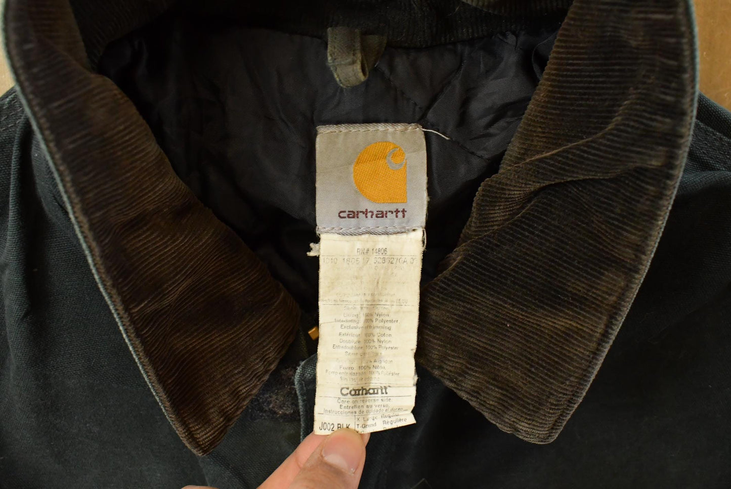 Vintage 1990s Carhartt Arctic Quilt Lined Jacket Men's XL / Distressed Sun Faded / Black Workwear Coat from propervintagecanada