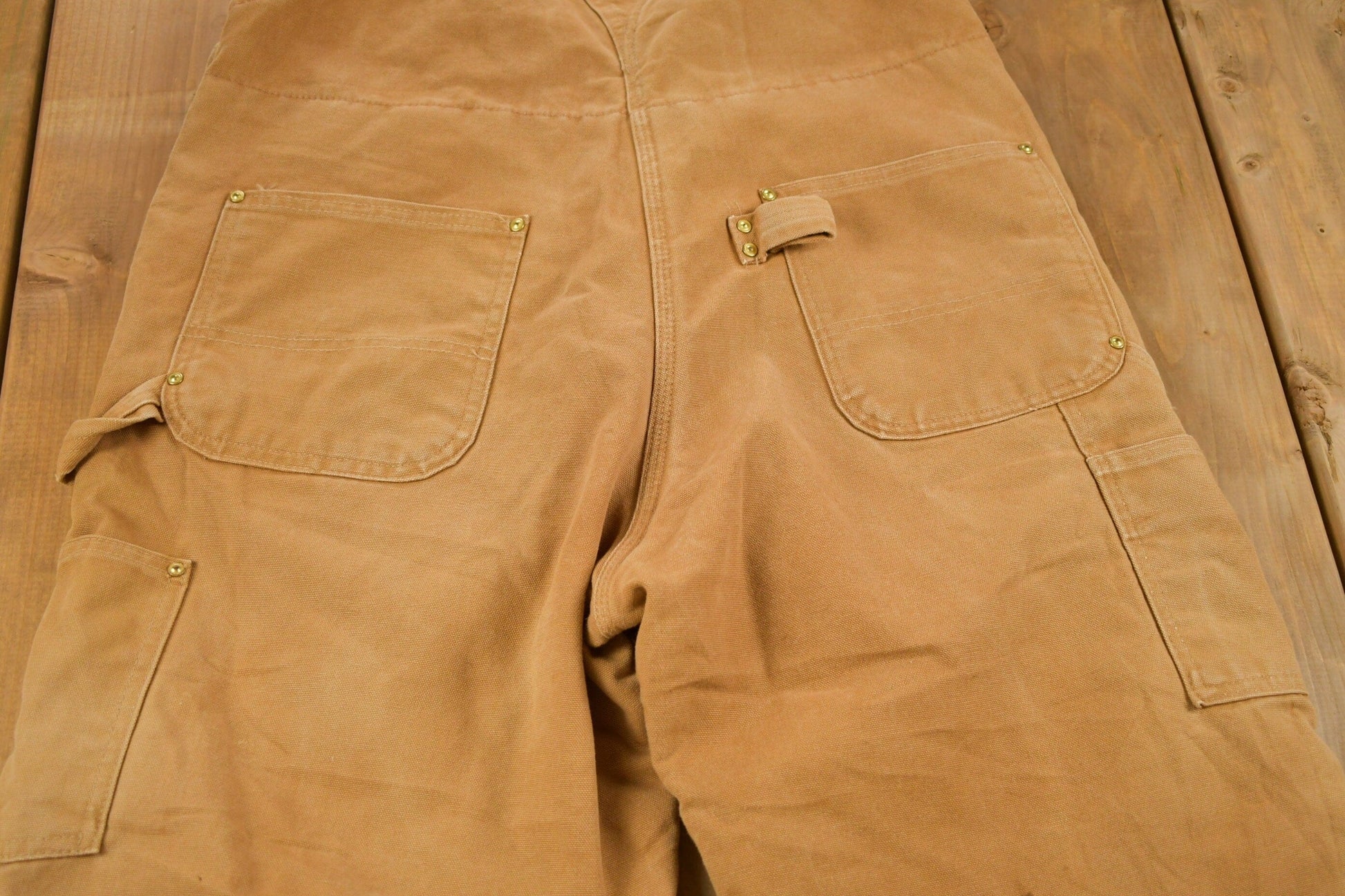 Vintage 1990s Carhartt Beige Double Knee Canvas Quilted Overalls Men's 38 x 30 from propervintagecanada