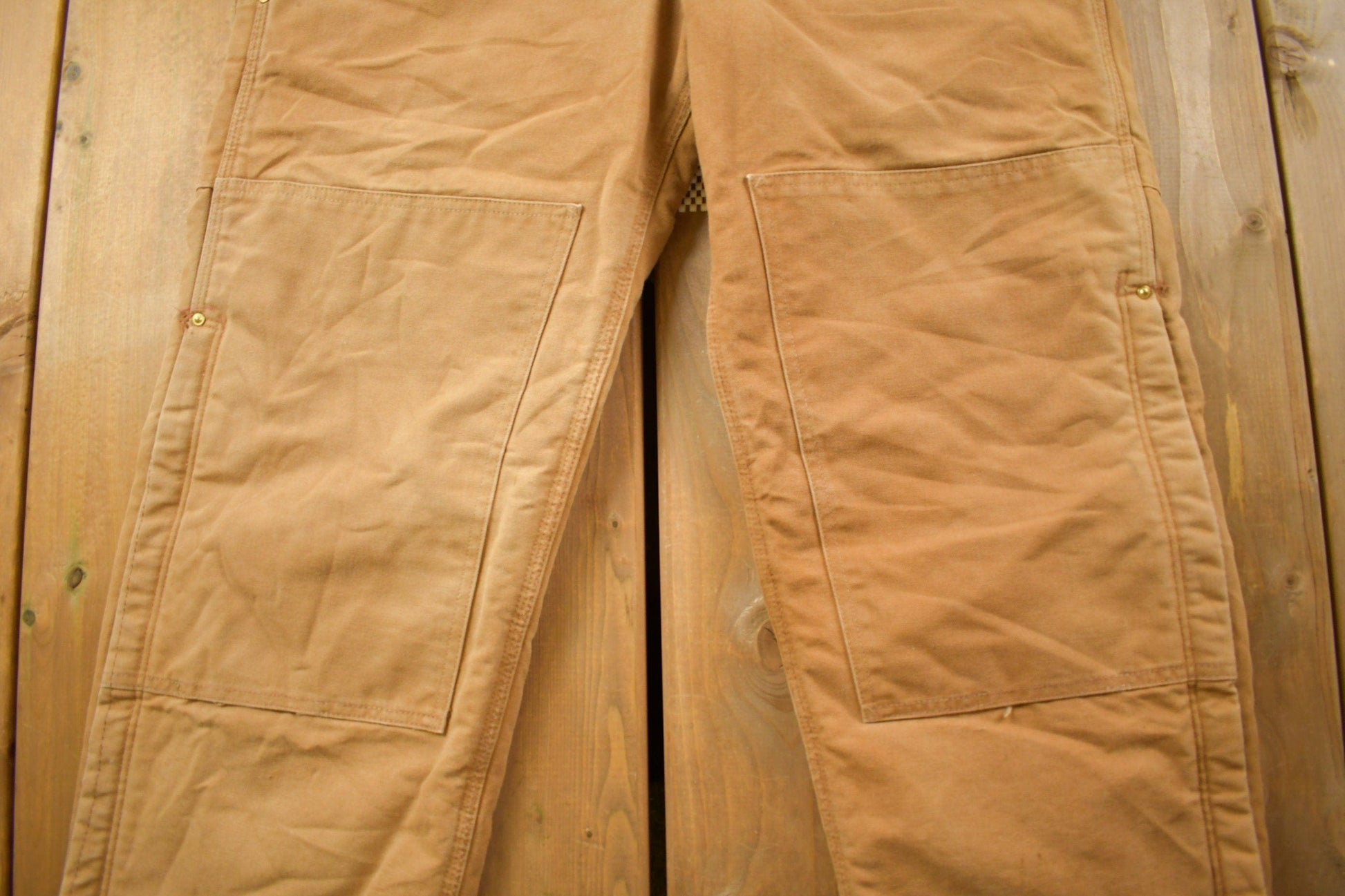 Vintage 1990s Carhartt Beige Double Knee Canvas Quilted Overalls Men's 38 x 30 from propervintagecanada