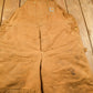 Vintage 1990s Carhartt Beige Double Knee Canvas Quilted Overalls Men's 44 x 30 from propervintagecanada