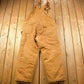 Vintage 1990s Carhartt Beige Double Knee Canvas Quilted Overalls Men's 44 x 30 from propervintagecanada