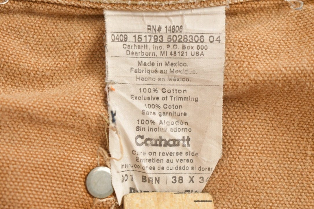 Vintage 1990s Carhartt Beige Double Knee Work Pants Men's 38 x 32 from propervintagecanada