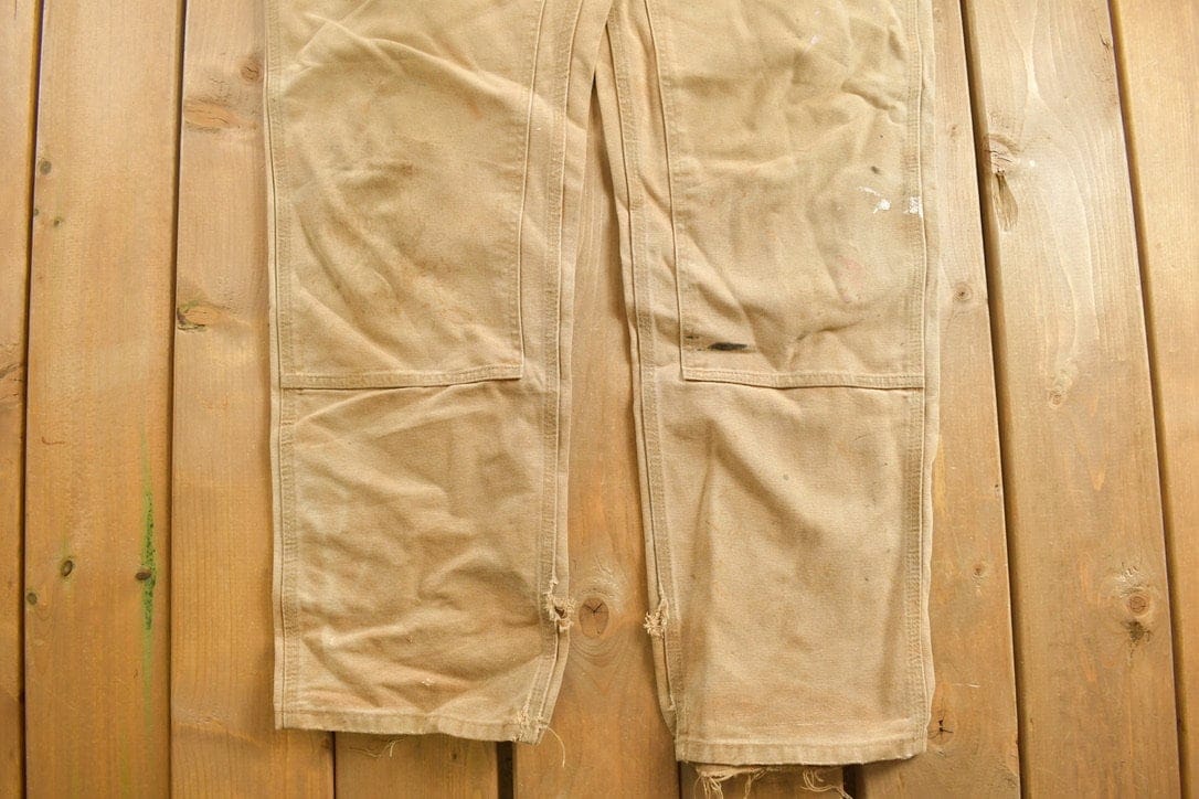 Vintage 1990s Carhartt Beige Double Knee Work Pants Men's 38 x 32 from propervintagecanada