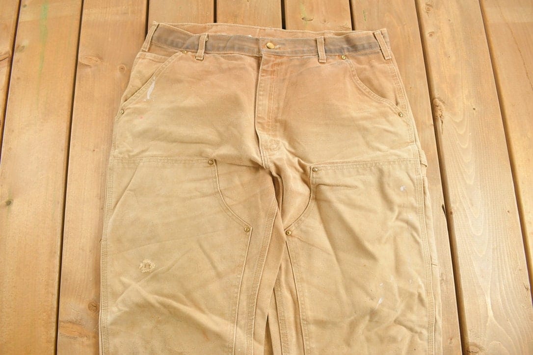 Vintage 1990s Carhartt Beige Double Knee Work Pants Men's 38 x 32 from propervintagecanada
