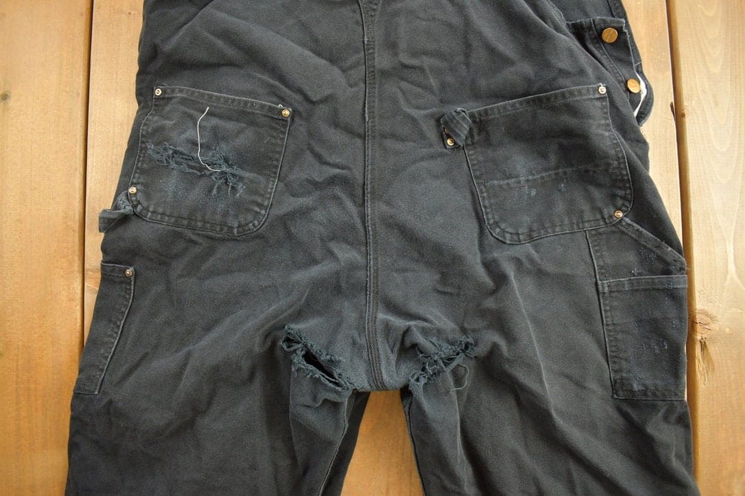 Vintage 1990s Carhartt Black Canvas Double Knee Overalls Men's 44 x 32 from propervintagecanada