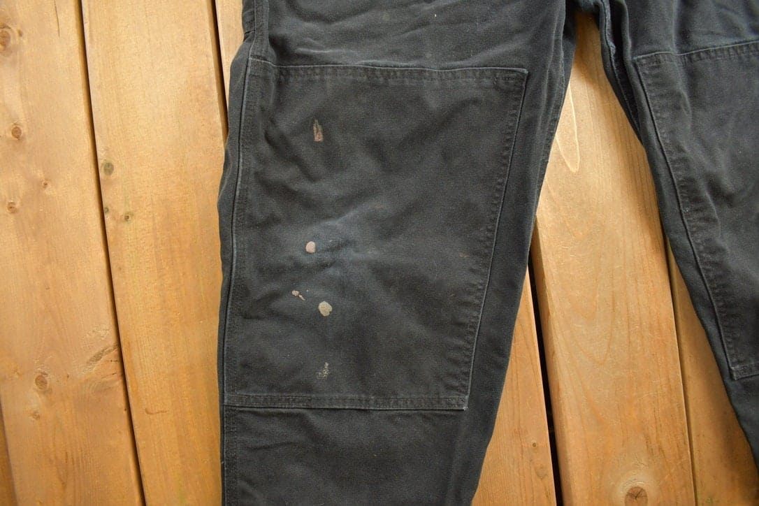 Vintage 1990s Carhartt Black Canvas Double Knee Overalls Men's 44 x 32 from propervintagecanada