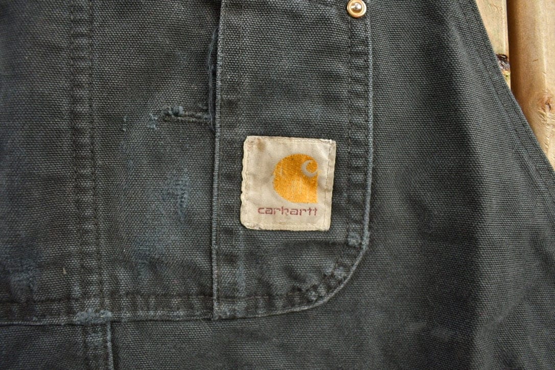Vintage 1990s Carhartt Black Canvas Double Knee Overalls Men's 44 x 32 from propervintagecanada