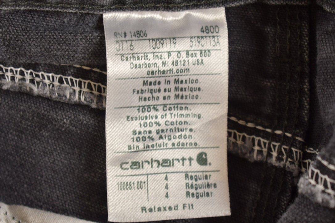 Vintage 1990s Carhartt Black Double Knee Work Pants Men's 31 x 29 from propervintagecanada