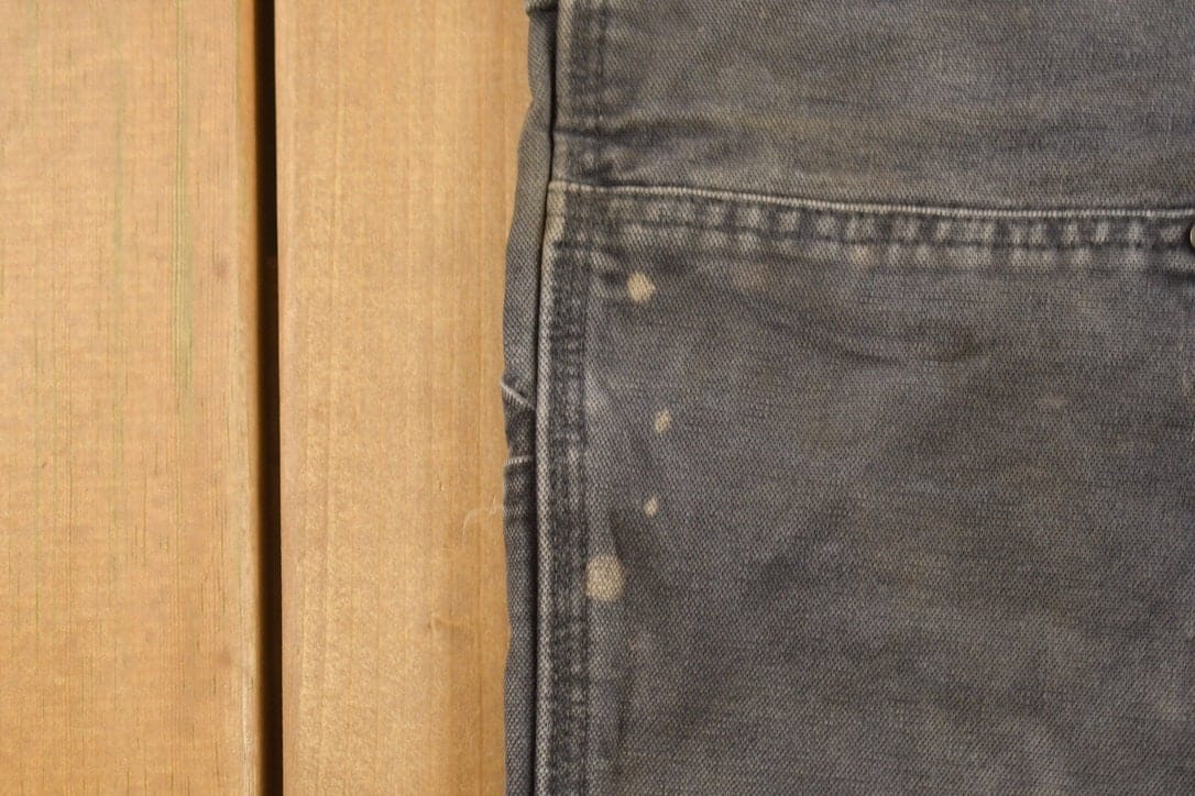 Vintage 1990s Carhartt Black Double Knee Work Pants Men's 31 x 29 from propervintagecanada