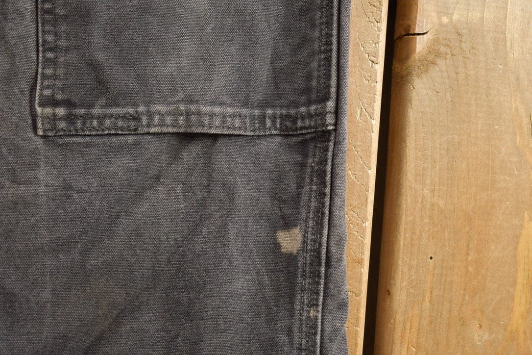 Vintage 1990s Carhartt Black Double Knee Work Pants Men's 31 x 29 from propervintagecanada