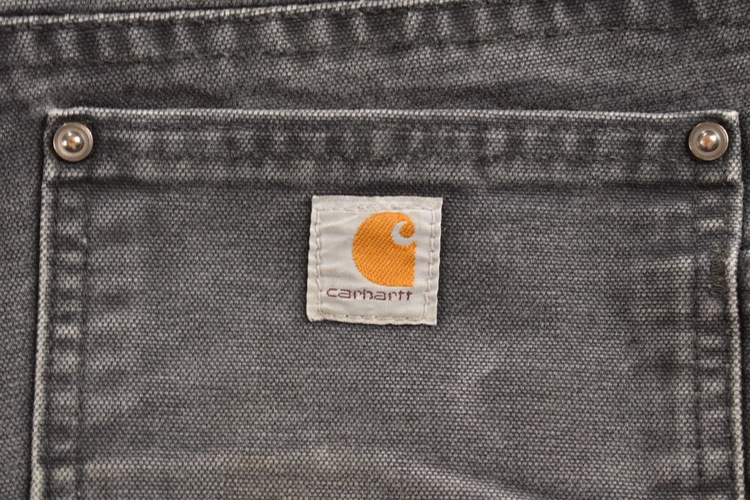 Vintage 1990s Carhartt Black Double Knee Work Pants Men's 31 x 29 from propervintagecanada