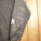 Vintage 1990s Carhartt Black Paint Splattered Hoodie Men's 2XL from propervintagecanada
