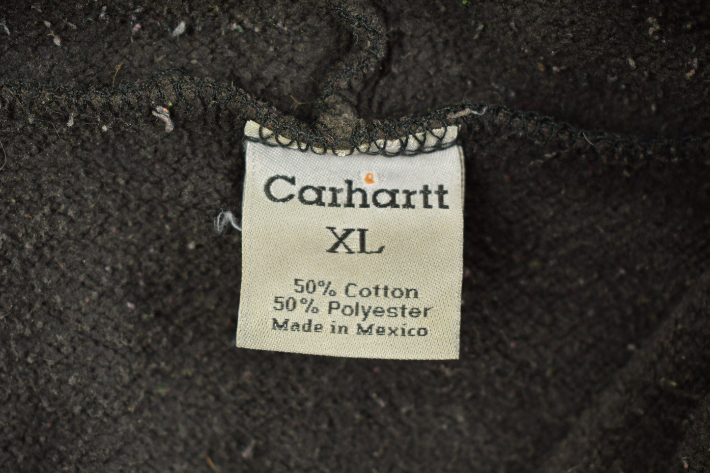 Vintage 1990s Carhartt Black Paint Splattered Hoodie Men's 2XL from propervintagecanada